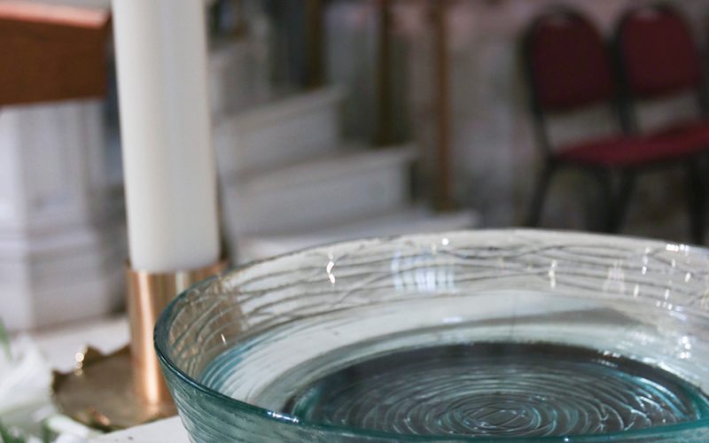 Paschal candle and holy water