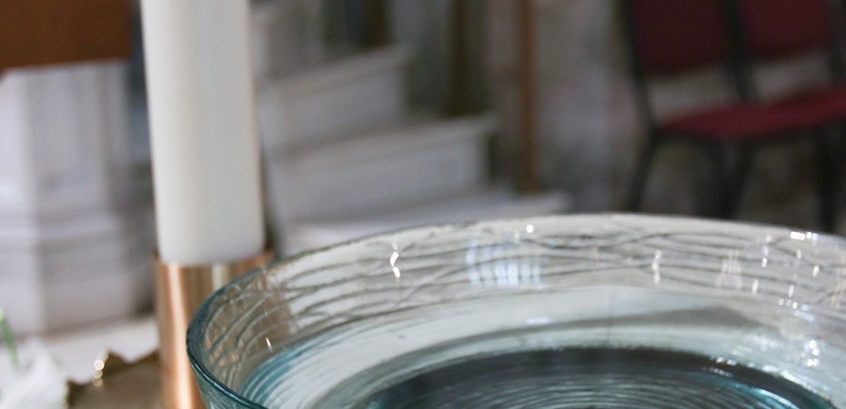 Paschal candle and holy water