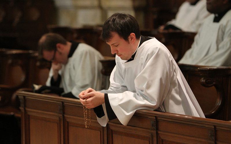 Seminarian prays rosary at St. Joseph's Seminary in New York