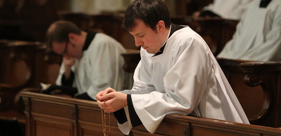 Seminarian prays rosary at St. Joseph's Seminary in New York