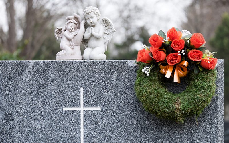 tombstone with angels