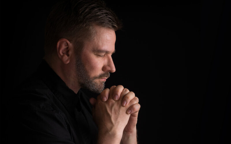 man praying