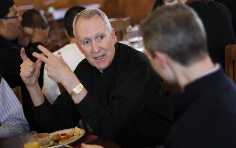 Priest chats with seminarian during retreat at New York seminary